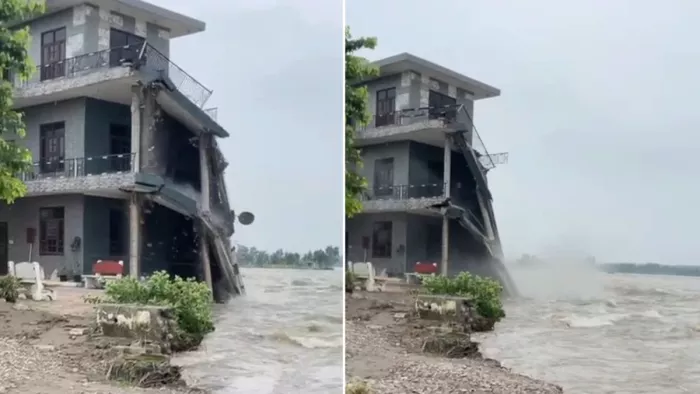 जिला कांगड़ा के फतेहपुर में मंड क्षेत्र में ब्यास नदी के बहाव में क्षतिग्रस्त हुआ मकान।