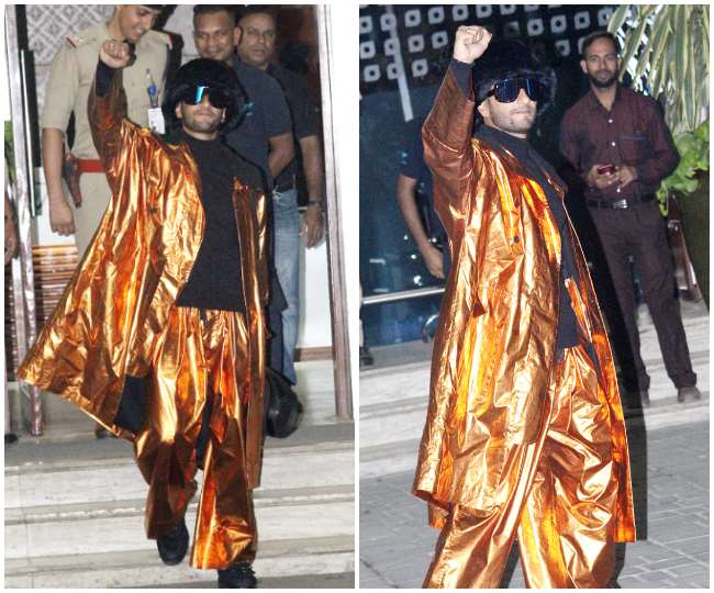 Ranveer Singh Look: एक बार फिर अतरंगे कपड़ों में दिखे रणवीर सिंह, लोग बोले-  गिफ्ट पैक करके छोड़ दिया - Ranveer Singh Weird Look Actor seen in orange  dress now users trolled