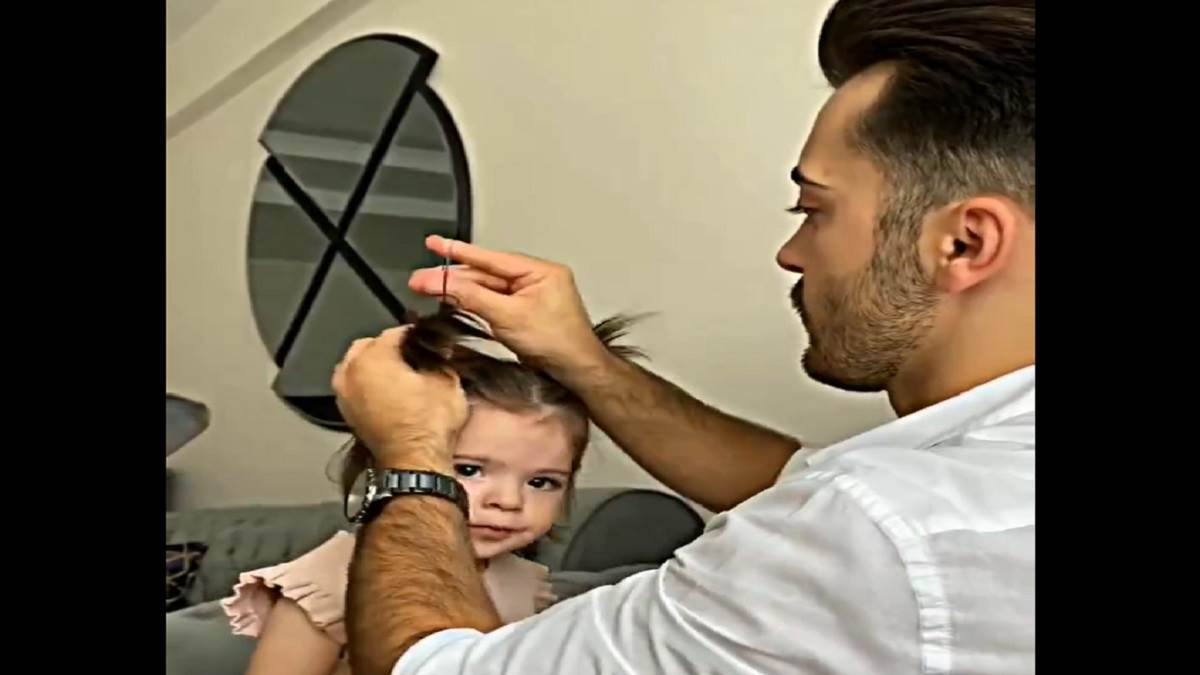 Viral Video पिता ने संवारे छोटी बच्ची के बाल, वीडियो देख लोगों ने कहा क्यूट पापा की परी