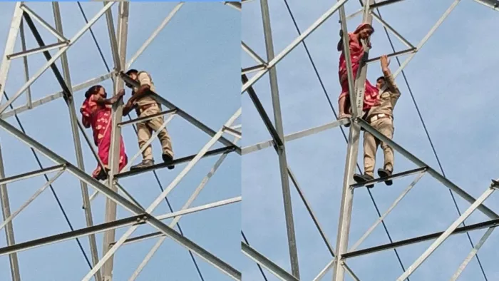 ट्रांसमिशन पावर लाइन के टावर पर चढ़ी महिला को उतारते पुलिसकर्मी।- जागरण
