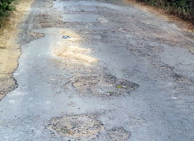 Villagers upset due to broken Dharamgarh Bohli road