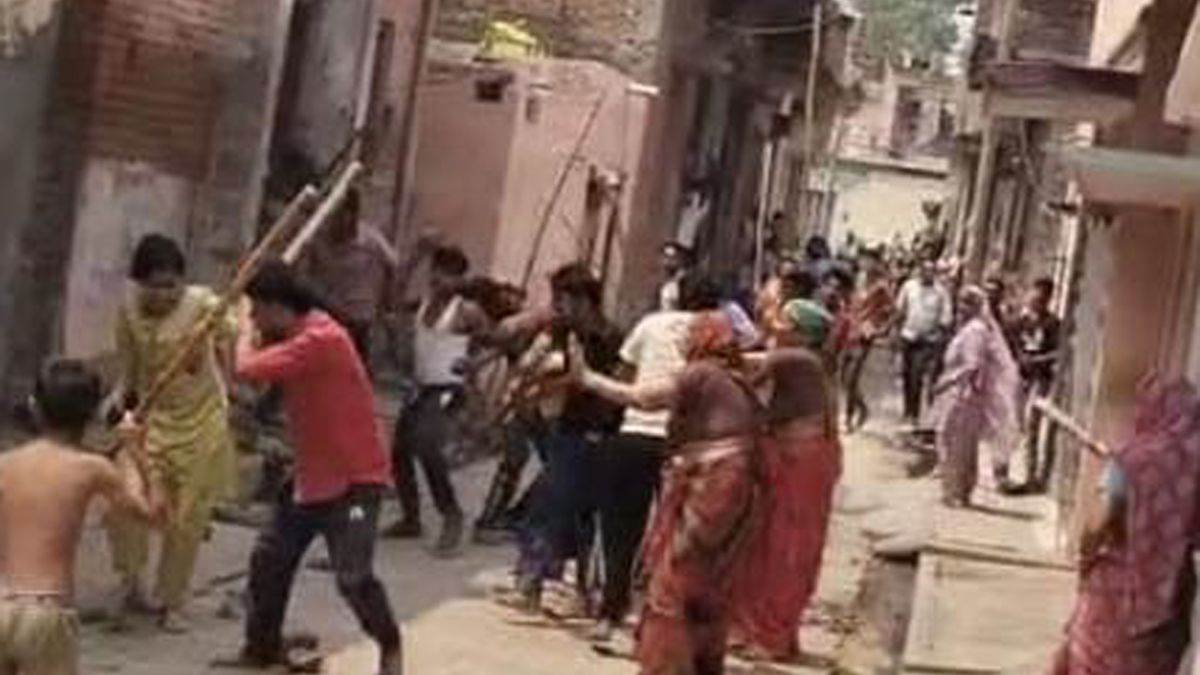 there was a ruckus between two parties over hitting a dog with a stick nine people were injured