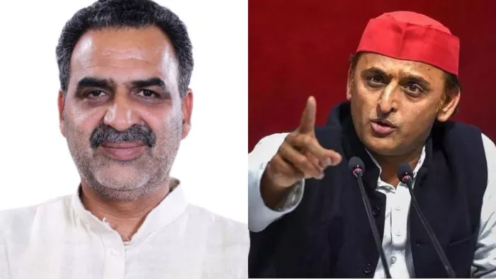 पूर्व केंद्रीय राज्यमंत्री डा. संजीव बालियान और सपा प्रमुख अखिलेश यादव।