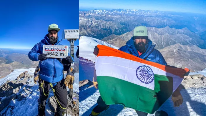 शशि शेखर माउंट एल्ब्रुस चोटी पर झंड़ा फहराते हुए