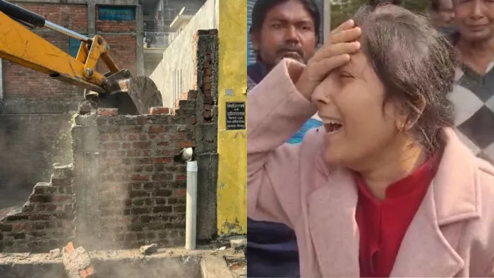 ख़रैया पोखरा पर अतिक्रमण हटाने के दौरान गिड़गिड़ाती महिला को रोकता नगर निगम की प्रवर्तन दल। जागरण