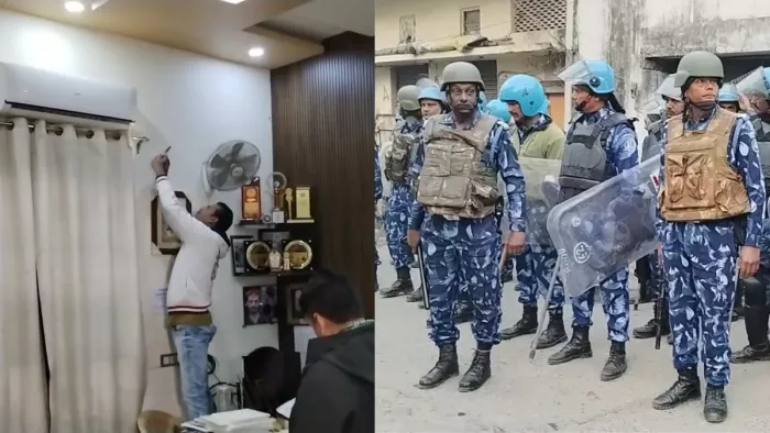 सांसद जियाउर्रहमान बर्क के आवास के बाहर पुलिस फोर्स और मीटर की जांच करते बिजली विभाग के अधिकारी।