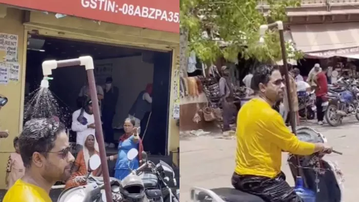 गर्मी को मात देने के लिए शख्स ने लगवा डाला स्कूटी पर शॉवर (फोटो-ऑनलाइन)