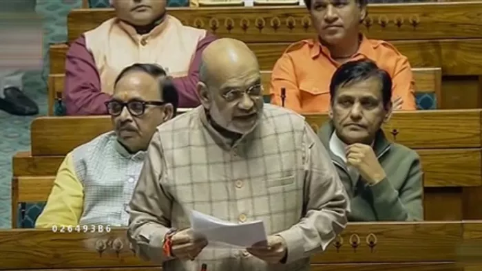 लोकसभा में केंद्रीय गृह मंत्री अमित शाह। (फोटो- एएनआई)