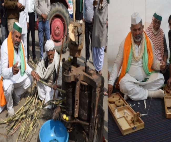यूपी गेट पर कोल्हू से गन्ने का जूस निकालते और चरखा से सूत कातते राकेश टिकैत। जागरण