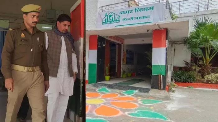 ट्रॉमा सेंटर से मेडिकल के बाद सपा पार्षद इमरान मंसूरी को ले जाते पुलिसकर्मी : जागरण
