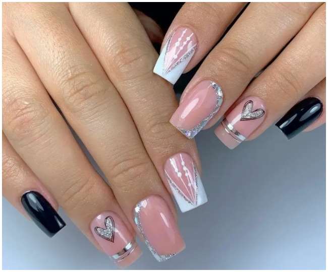 Nail Care Tips: लंबे और खूबसूरत नाखूनों के लिए अपनाएं ये 5 ट्रिक्स - Follow these 5 tricks for long and beautiful nails Nail Care Tips: लंबे और खूबसूरत नाखूनों के लिए अपनाएं ये 5 ट्रिक्स - Follow these 5 tricks for long and beautiful nails