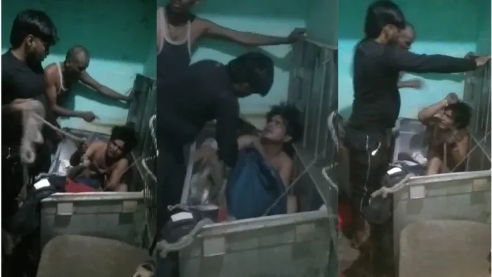 संदूक में मिले प्रेमी की पिटाई करते हुए स्वजन। वीडियो से ली तस्वीर।