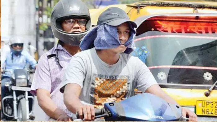 UP Weather News: पालीटेक्निक चौराहे पर चिलचिलाती धूप में इस अंदाज में दिखे बाइक सवार l जागरण
