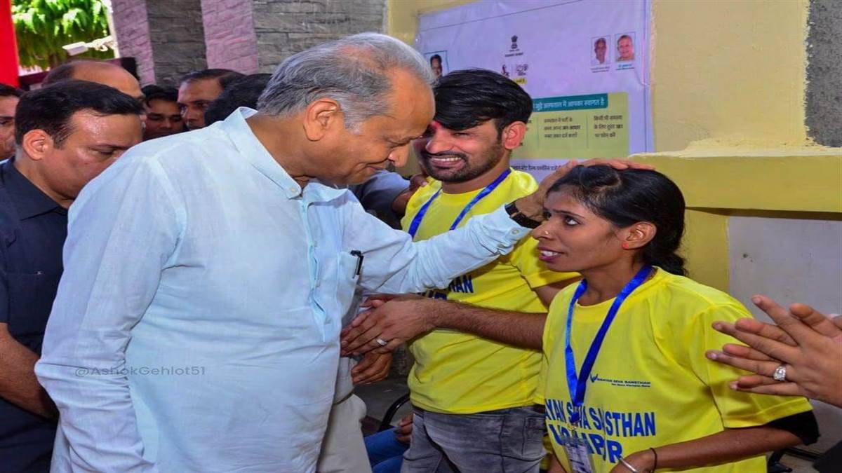 ashok gehlot distributed artificial limbs to disabled in udaipur said doing something for them gives relief
