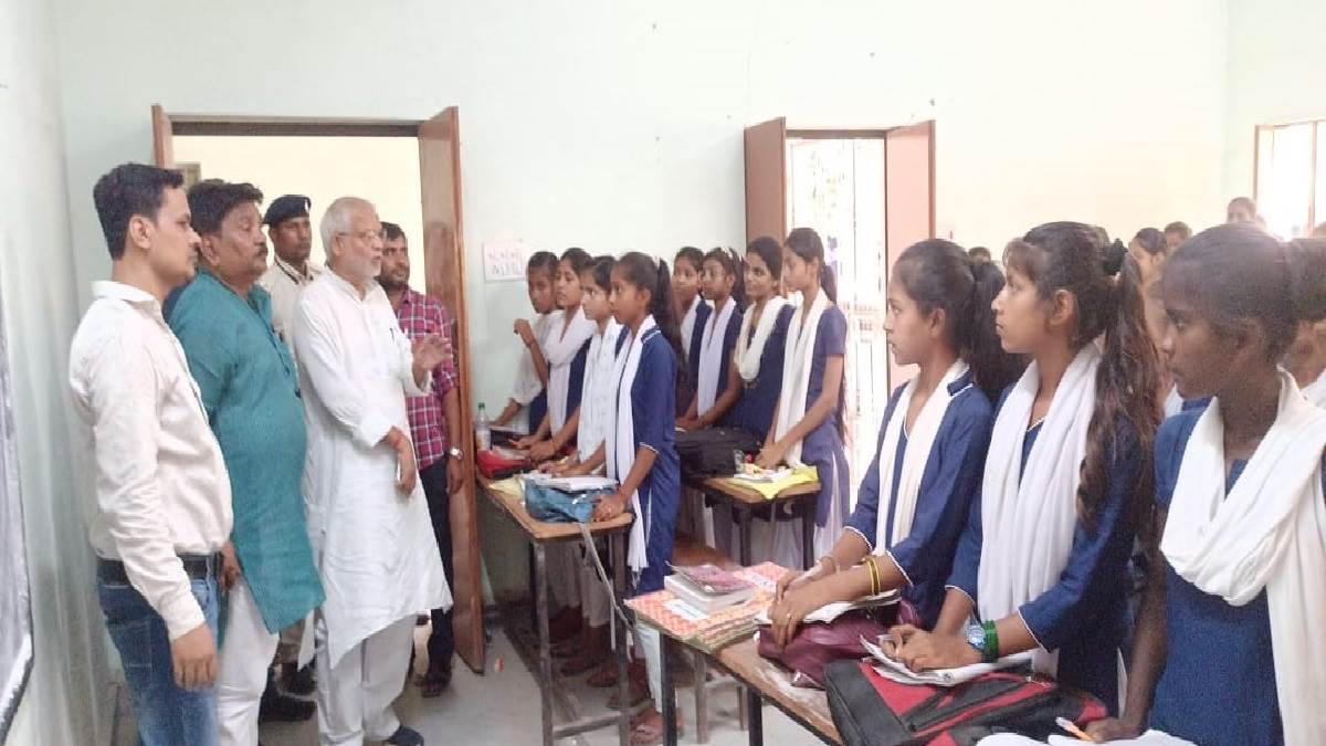 seeing the video of the children running away after climbing the boundary wall the mla reached the school to give advice talked to the girl students