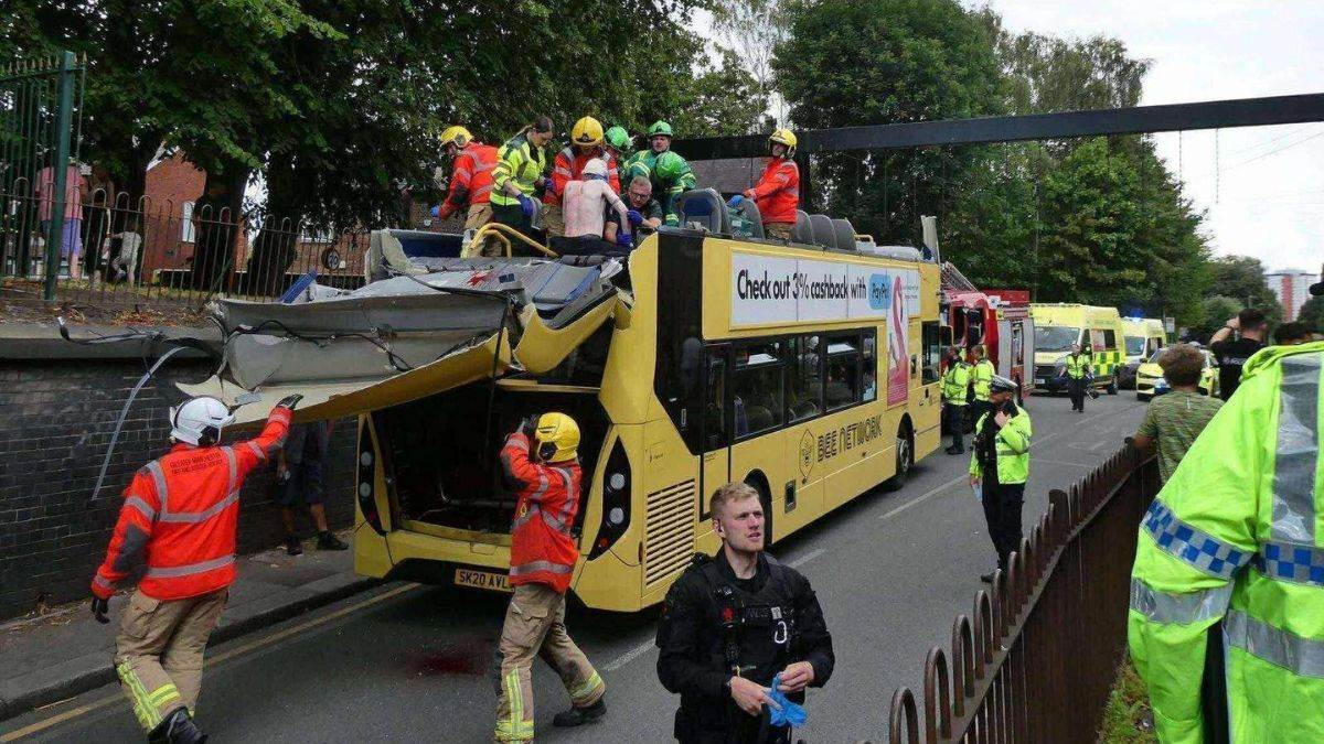 a double decker bus collided with low bridge in britain tearing off roof video