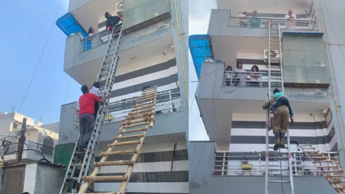 आग लगने के बाद दमकल विभाग ने दो लोगों को सुरक्षित बचाया।