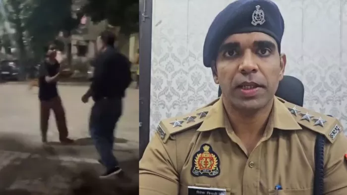 रास्ते में कुत्ते को खाना खिलाने पर मारपीट, केस दर्ज। वीडियो ग्रैब