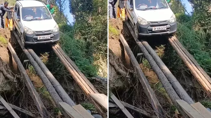 मंडी जिला के सराज में जुगाड़ से बनाए टेंपरेरी पुलिया के ऊपर से गाड़ी निकालते लोग।