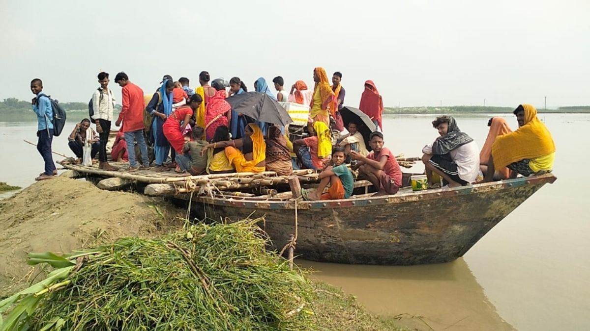 alauli residents struggle with river crossing for basic needs