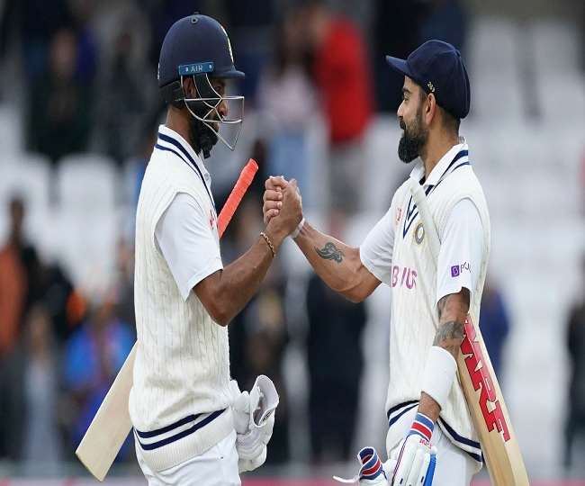 भारतीय टेस्ट कप्तान विराट कोहली और पुजारा (एपी फोटो)