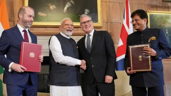 ब्रिटेन के साथ कंप्रेहेंसिव इकोनॉमिक एंड ट्रेड एग्रीमेंट पर दस्तखत हुए (फोटो: रॉयटर्स)
