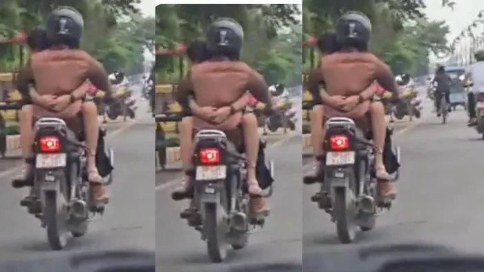 युवती उल्टी दिशा में टंकी पर बैठी, युवक चला रहा था बाइक।- फोटो- वीडियो ग्रैब