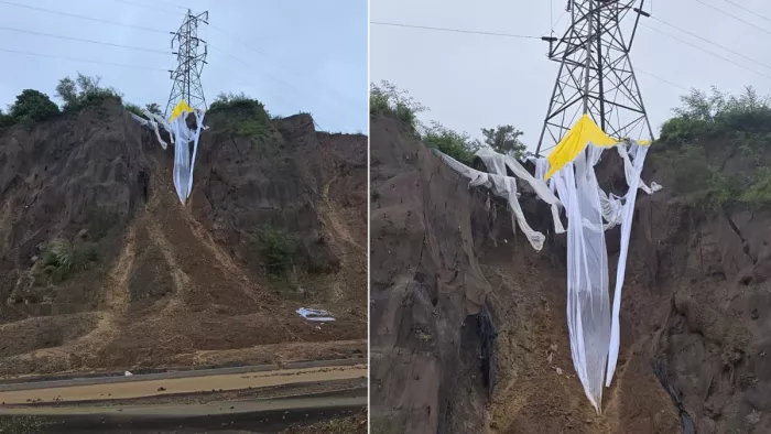 नूरपुर के बौड में फोरलेन किनारे गिरने के कगार पर बिजली लाइन का टॉवर। जागरण