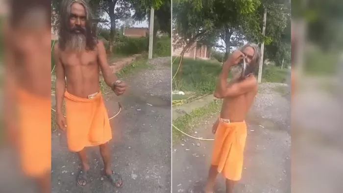 Video: दुकान से सांप को पकड़ कर मोबाइल पर रील बनाने वालों को दे रहा था ...