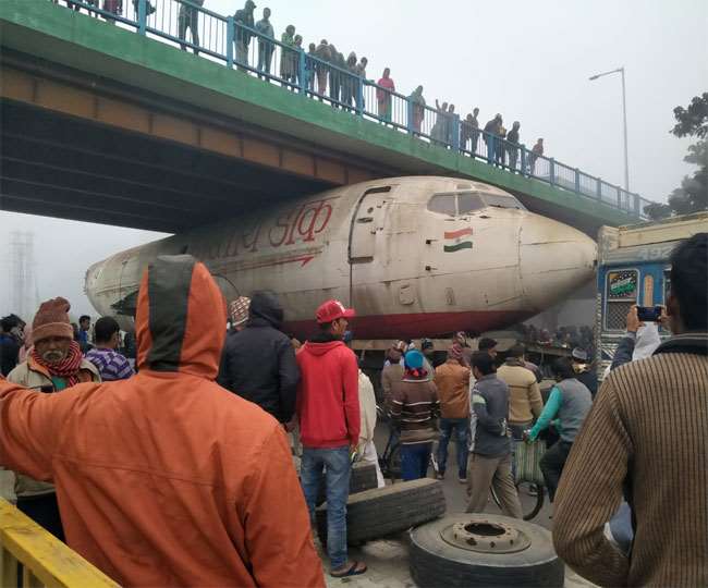 Image result for aircraft-stuck-under-bridge-west-bengal