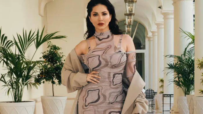 Sunny Leone Stuns in Pink Trellis High Thai Slit Gown at Cannes Film Festival 2023/Instagram