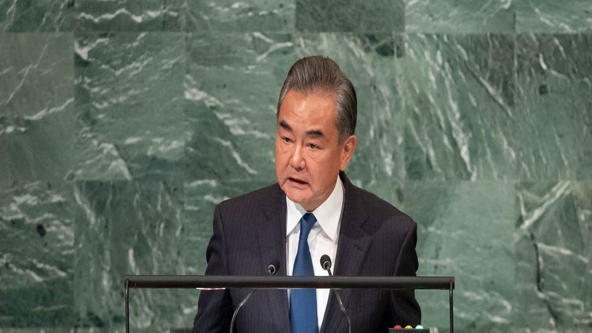 at un china foreign minister wang yi sees hope in turbulent times reaffirms one china policy