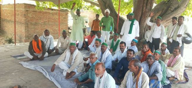 farmers will agitate till the toll plaza is removed