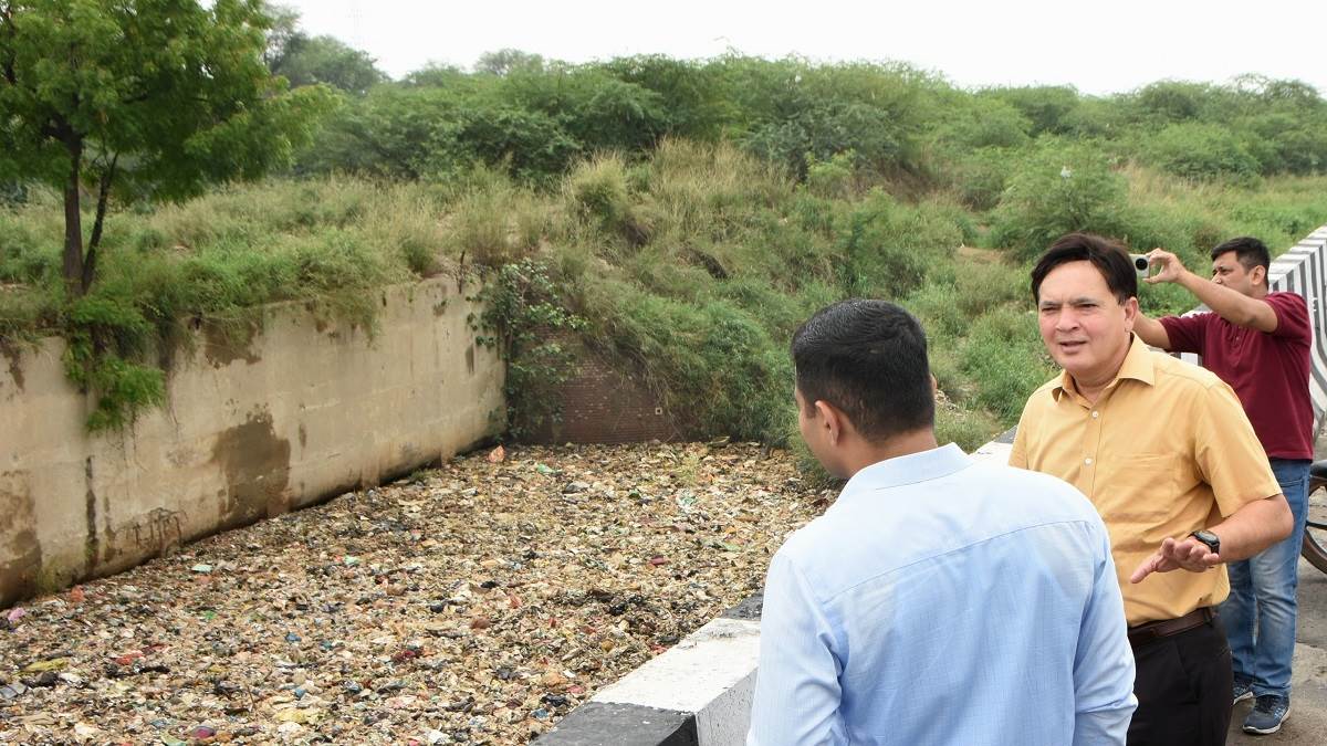 ncr faridabad news dc orders drain encroachment removal after inspection