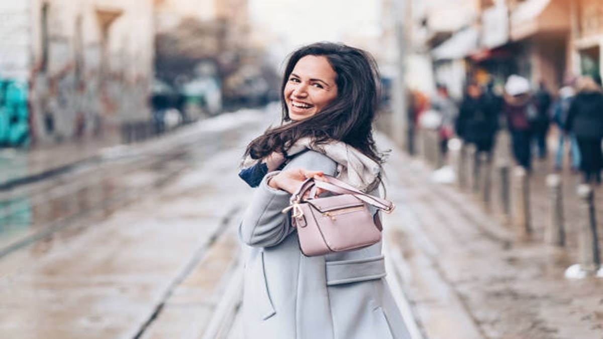 You should definitely buy this metallic Michael Kors crossbody bag while  it's under $100 for Prime Day