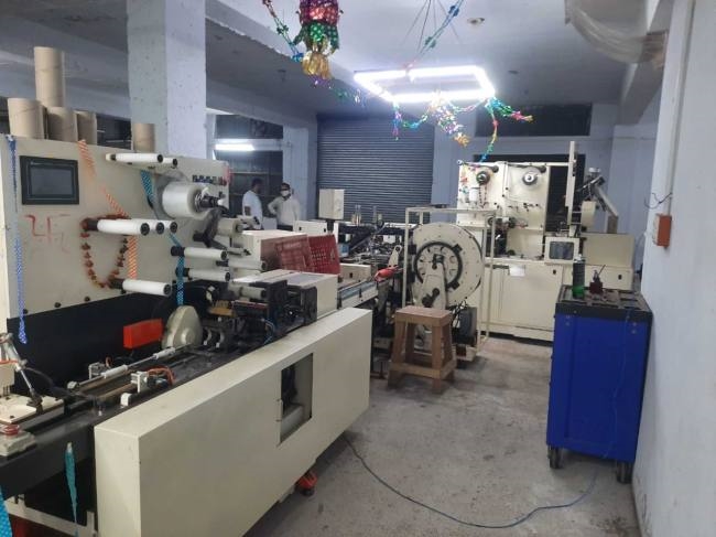 to make cigarettes a machine came from hyderabad was installed in saha