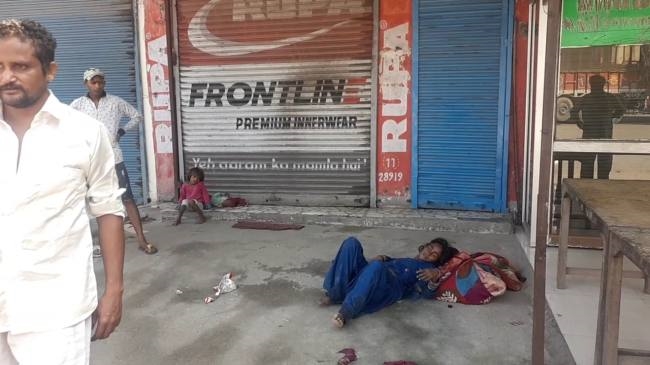 the beggar created a ruckus by intoxication the shopkeepers handed over the child center