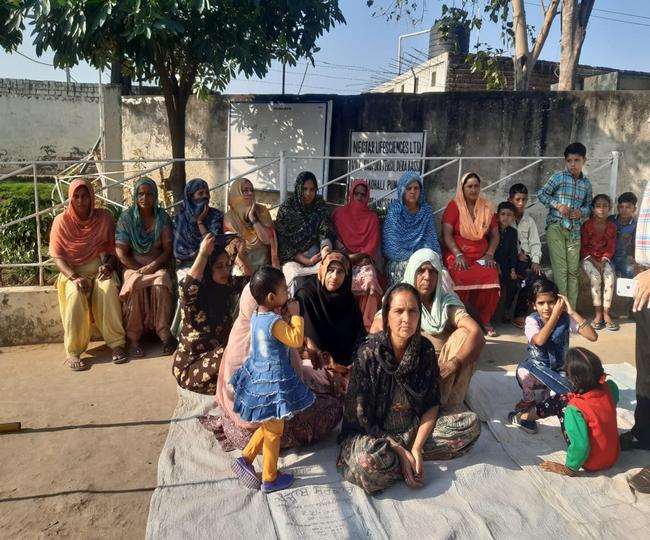 local people against pharma factory in derabassi protest in front of factory gate