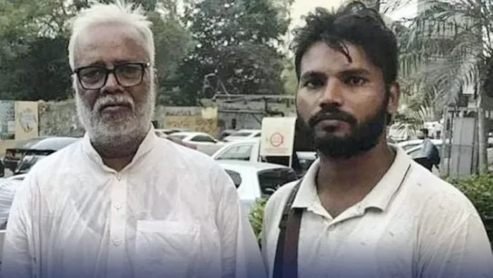 पुत्र इसहाक आमिर के साथ 70 वर्षीय मोहम्मद हसनैन। प्रेट्र