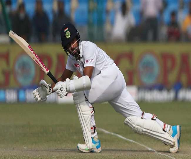 साहा ने कानपुर टेस्ट की दूसरी पारी में 61 रन की पारी खेली (एपी फोटो)