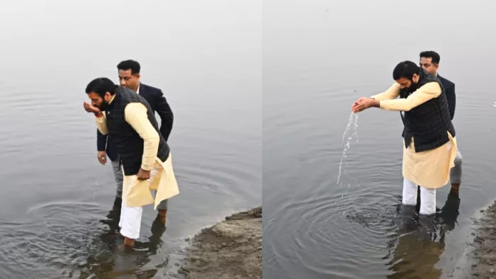 यमुना नदी में पानी का आचमन करते हुए सीएम नायब सिंह सैनी (जागरण फोटो)