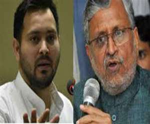 नेता प्रतिपक्ष तेजस्&zwj;वी यादव और राज्&zwj;य सभा सदस्&zwj;य सुशील कुमार मोदी की तस्&zwj;वीर ।