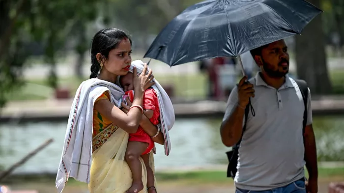 दिल्ली में 52.3 डिग्री पहुंचा तापमान, भट्टी में जलने जैसा महसूस कर रहे दिल्लीवाले। फोटो- AFP