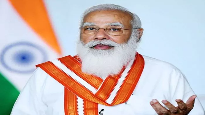 PM Narendra Modi:-भारतीय संस्कृति के अवतार में खिलौने, साड़ी पहने गुड़ियां