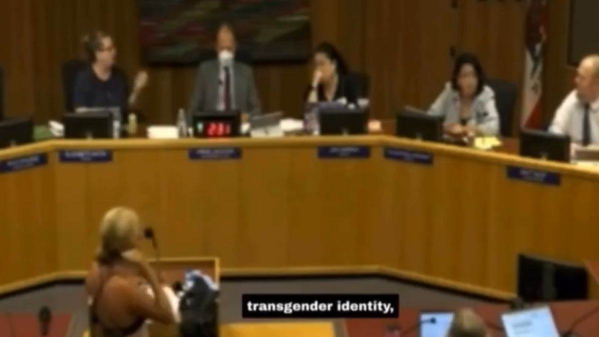 beth born strips in front of school board official for transgender locker room policy