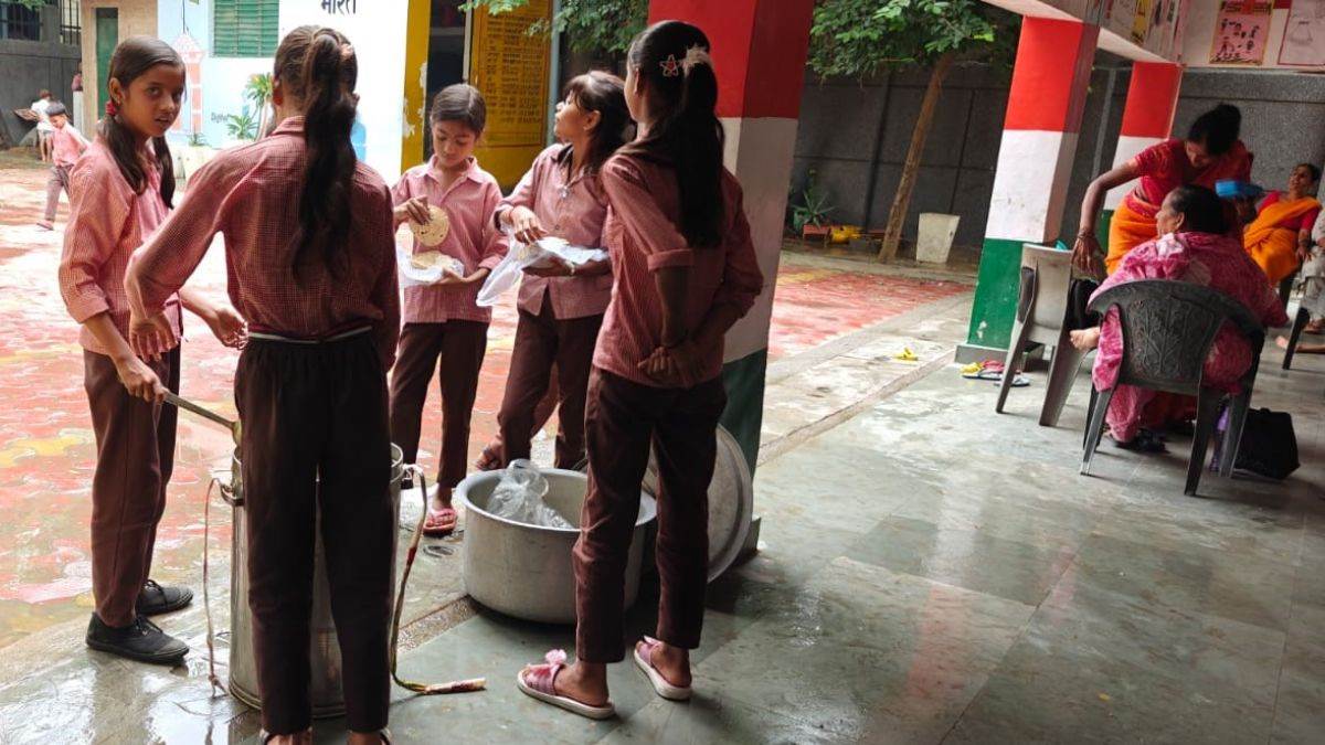 ncr noida schools students distributing mid day meals noida news